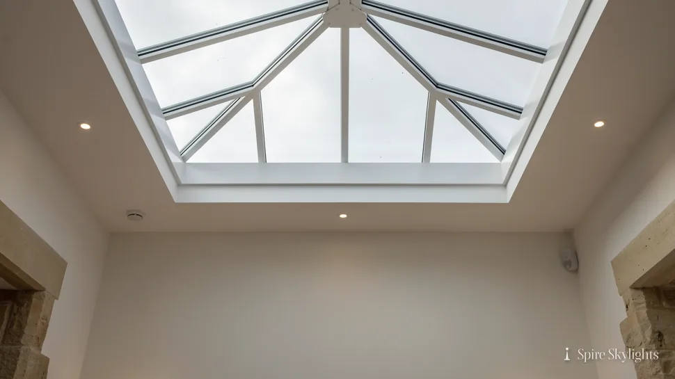 Roof lantern seen from below, set in a white ceiling with downlights